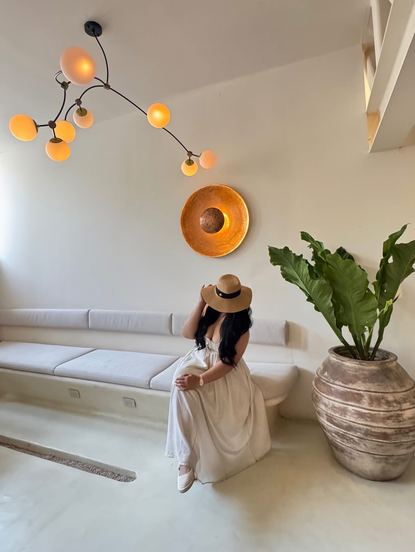 Jennifer in a serene neutral-toned interior